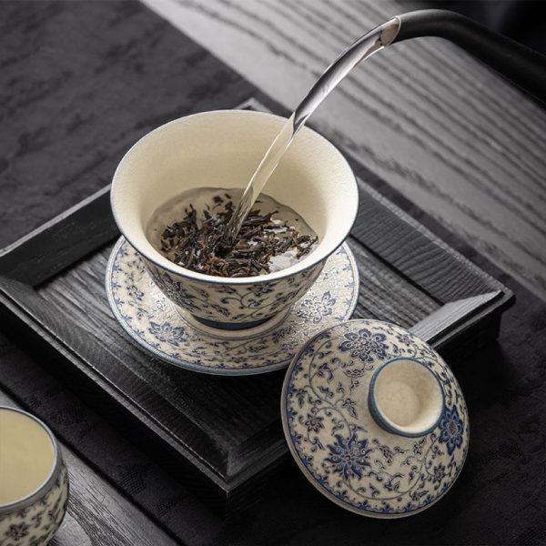 24e83cd725d87f0744ac2b1588f16b58 Blue and flower twig lotus three talents cover bowl tea cup